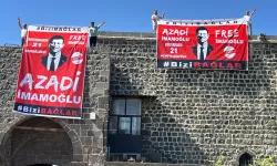 Diyarbakır surlarında Kürtçe "İmamoğlu'na özgürlük" pankartı asıldı: Gözaltına alındılar!