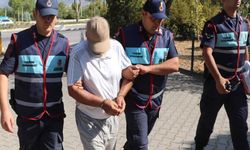Turistlerin gizlice fotoğrafını çekerken yakalandı: Telefonundan 'arşiv' çıktı, serbest bırakıldı...