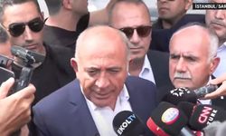 Kayyum Gürsel Tekin polis eşliğinde girdiği binadan çıktı