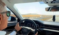 Bakan Uraloğlu Meclis'te TOGG'a otoyolda Audi’ye biniyor